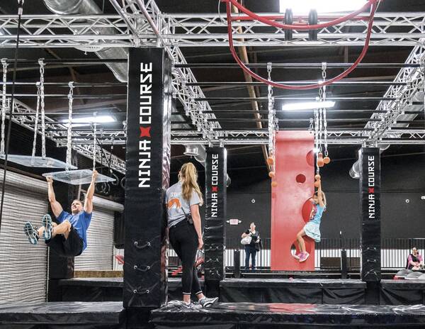 Climbers tackling the warrior-style ninja obstacle course